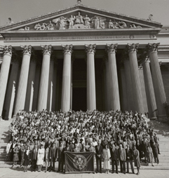 Staff on steps of National Archives Building