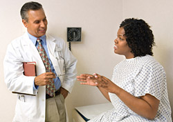 Photo: Doctor speaking with patient