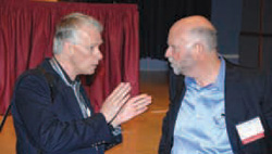 Nobel Laureate Dr. Rich Roberts (left) chats with Dr. J. Craig Venter.