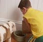 child feeding dog