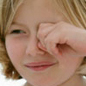 Photo: Little Girl rubbing her eye