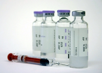 syringe and vials of medicine