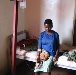 Image of a patient hooked up to an IV receiving treatment for African Trypanosomiasis.
