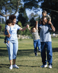 Photo: A family walking in a park