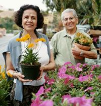 Photo: Older Hispanic couple in garden
