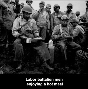 Labor battalion men enjoying a hot meal