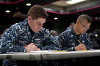 Personnel Specialist 1st Class Theodore L. Metcalf assigned to the Fleet and Family Support center on Commander Fleet Activities Yokosuka takes the chief petty officer advancement exam.