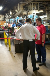 Deputy Secretary Tony Miller speaks with a worker at the Continental Tire facility. Official Department of Education photo by Joshua Hoover.