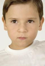 Photograph of a stern young boy