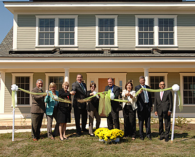 photo of ribbon-cutting at NIST Net Zero house