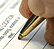 Close-up photo of a pen on paper.