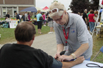 Upper Merrimack Valley MRC (MA) volunteer performs a blood pressure check.