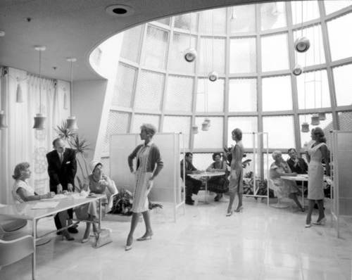 Image description: This photo from around 1956 shows models posing in a showroom at the Alix factory in Miami, Florida.
Photo from the State Archives of Florida