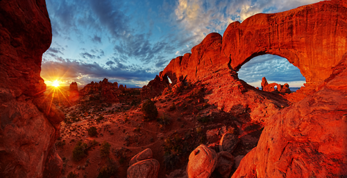 From America&#8217;s Great Outdoors:

Arches National Park in Utah preserves over 2,000 natural sandstone arches, like the world-famous Delicate Arch, as well as many other unusual rock formations. In some areas, the forces of nature have exposed millions of years of geologic history. The extraordinary features of the park create a landscape of contrasting colors, landforms and textures that is unlike any other in the world. Photo: Jim Karczewski - National Park Service
