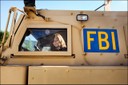 As part of ongoing community outreach efforts, the FBI Jacksonville Field Office recently participated in the national Bring Your Child to Work Day on April 26. Approximately 40 children and teens were treated to demonstrations of various aspects of the work the FBI does daily. Pictured above, a participant looks out from the front seat of an FBI mine-resistant, ambush-protected vehicle.