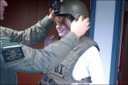 In Norfolk, a teenager taking part in a community outreach effort tries on some SWAT (Special Weapons and Tactics) gear. Our Norfolk office recently gave 10 young men and women from the Virginia Beach Police Department’s Explorers’ Program an inside look at Norfolk’s Special Weapons and Tactics (SWAT) Team. The students, who were between the ages of 14 and 21 and are interested in serving in law enforcement, were briefed by SWAT agents on how they train for high-risk situations and were allowed to try on some authentic SWAT gear.