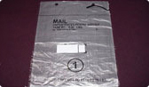 A picture of a flat unpuffed plastic bag with 'Mail' written on it