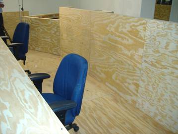 clerk and court reporter stations in fron of the bench (side view)