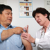 photo of a doctor administering an injection to a patient