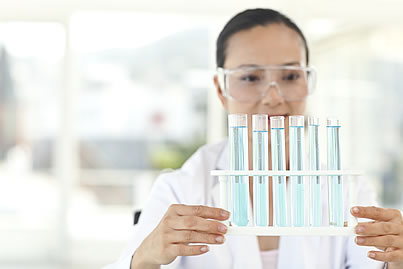 scientist with test tubes