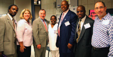 Photo of Chicago Mayor Richard M. Daley with TASC graduates