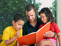 Father reads to kids