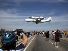 The space shuttle Endeavour, atop the Shuttle Carrier Aircraft, or SCA, lands at Los Angeles International Airport on Tuesday, Sept. 21, 2012 in Los Angeles where it will be placed on public display at the California Science Center.