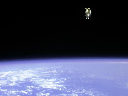 Image description: On February 12, 1984, astronaut Bruce McCandless ventured further away from the confines and safety of his ship than any previous astronaut had ever been. This was made possible by a nitrogen jet propelled backpack.
After a series of test maneuvers inside and above Challenger&#8217;s payload bay, McCandless went &#8220;free-flying&#8221; to a distance of 320 feet away from the Orbiter. This stunning orbital panorama view shows McCandless amongst the black and blue of Earth and space.
Photo by NASA