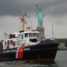 Coast Guard boat and the Statue of Liberty