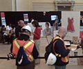 2009 Road Show - Construction workers get screened at The Heart Truth Road Show at Grand Central Terminal in New York.