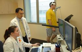 Dr Chen and staff testing exercise monitoring software