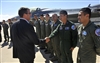 Deputy Secretary Carter shakes hands with F-16 Fighting Falcon training students 