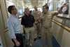 Deputy Secretary Carter and Navy Secretary Maybus are given a tour of the Commander, Naval Air Forces headquarters 