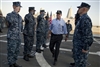 Deputy Secretary Carter goes through the sideboys as he is piped ashore after visiting the USS Freedom