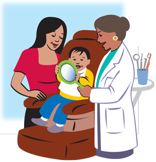 El dentista examina los dientes del niño.