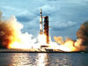 A Saturn V launches from the pad