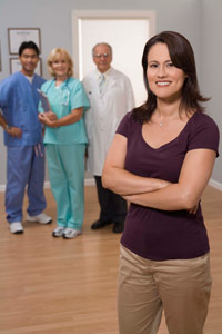 Woman with a team of doctors and nurses