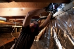Adding insulation in an existing home saves money and improves comfort. | Photo courtesy of Dennis Schroeder, NREL.