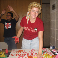photo of female student making a poster