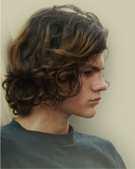 photo of male teen looking melancholy