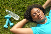 A girl rests after a workout