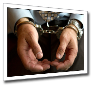 Handcuffs on hands angled graphic