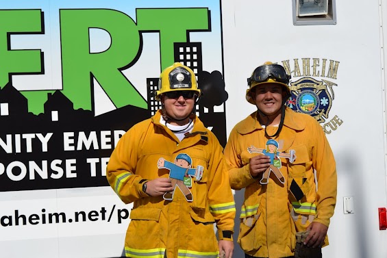 Flat Stanley and Flat Stells with Firefighters.
