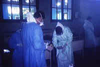 Physicians wearing protective equipment