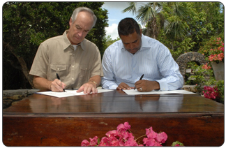 Secretary of the Interior Dirk Kempthorne and USVI Governor John de Jongh.  At a press conferences on the islands of St. Croix and St. John, Kempthorne awarded more than $2.5 million in grants to the USVI from Interior's Office of Insular Affairs.