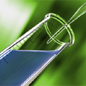 Pipette and a test tube with a green background.