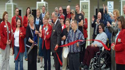 [Photo: Ribbon Cutting photo and Easter Seals Independent Living Complex Grand Opening.]