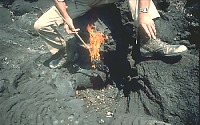Burning torch on end of stick, Nyamuragira Volcano, Zaire