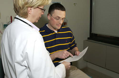 Photo of physician consulting with a patient