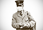 A mail carrier wears a mask to cover his mouth